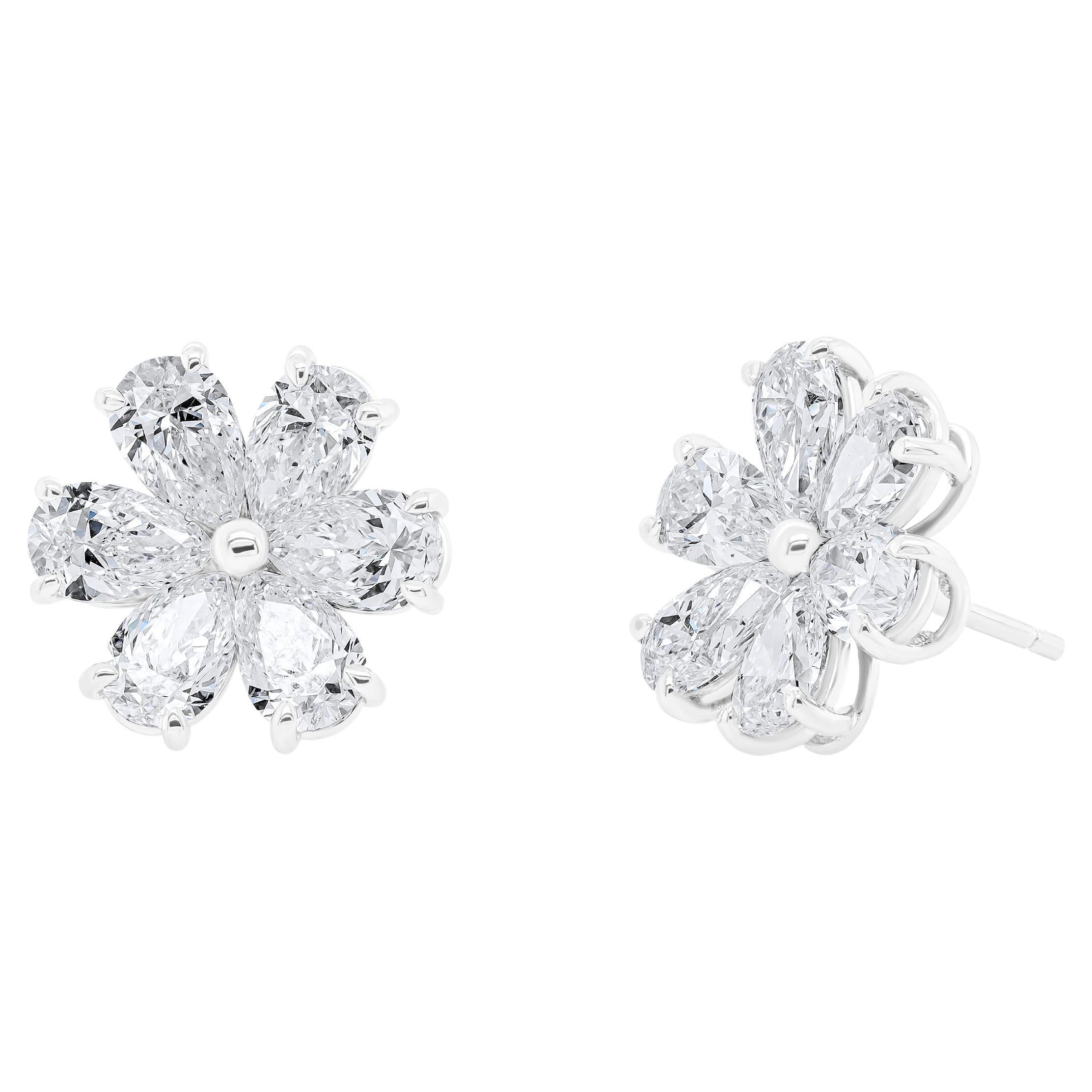 18Kt White Gold Diamond Flower Earrings Featuring 6.05cts or 12 GIA certified  pear shape matching diamonds. D-G in color and VS clarity. 

