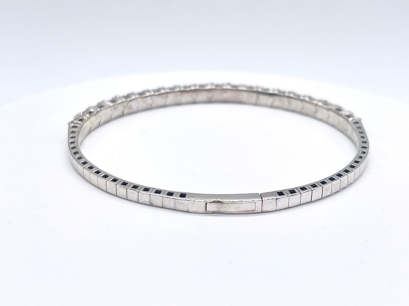4,80 Karat Natürliche Diamanten Mini-Armreif mit rundem Brillantschliff aus 14 Karat Weißgold. 
7 Zoll. 20Stück Durchschnittlich F-G,I  4,5 mm breit. Sehr glänzend 12.57 Gramm.

*Kostenloser Versand innerhalb der USA*