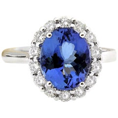 Bague en or blanc massif 14 carats avec tanzanite naturelle et diamant 