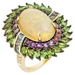 Opale Sunita Nahata 4.80ct. Anello fantasia in 18KYG con gemma e diamante.