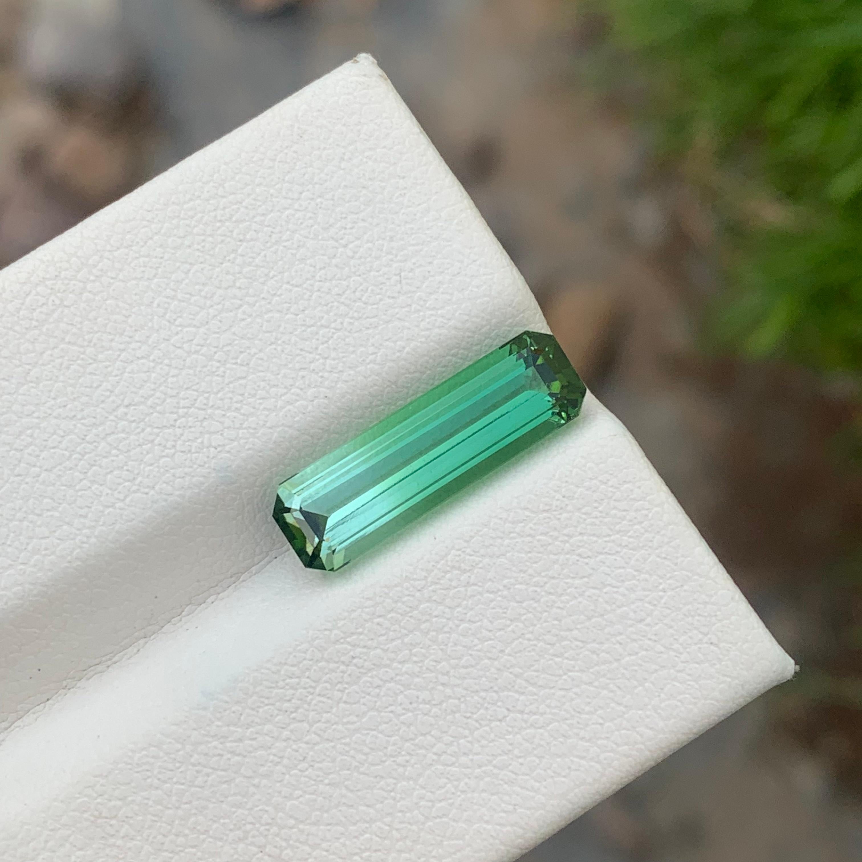 Faceted Tourmaline 
Weight: 4.80 Carats 
Dimension: 18.2x5.6x5 Mm
Origin: Kunar Afghanistan 
Shape: Emerald 
Color: Bicolor ( Mint & Green) 
Treatment: Non
Certificate: On Customer Demand 
Bicolor tourmaline is a captivating gemstone prized for its