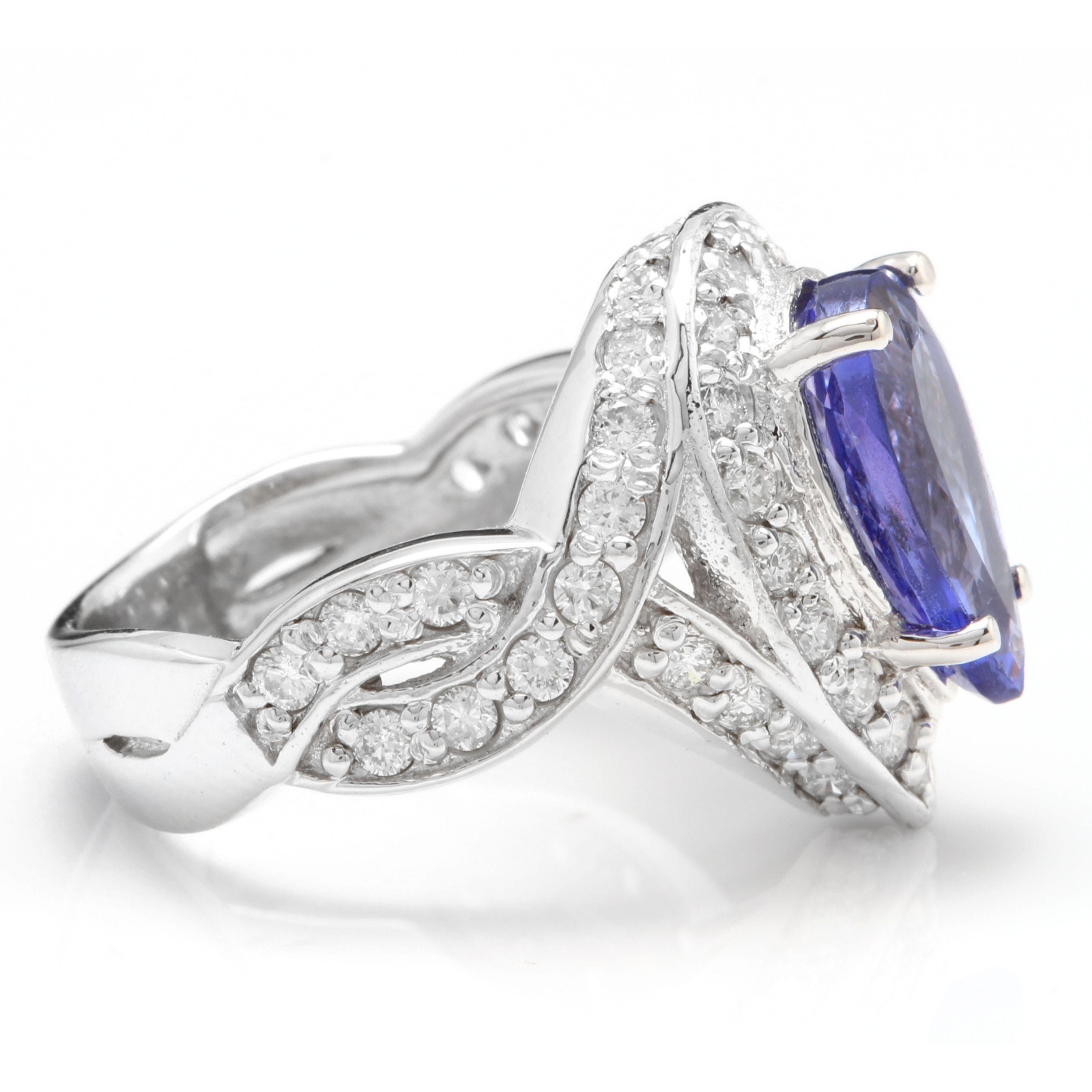 Mixed Cut 4.80 Carat Natural Tanzanite and Diamond 14 Karat Solid White Gold Ring For Sale