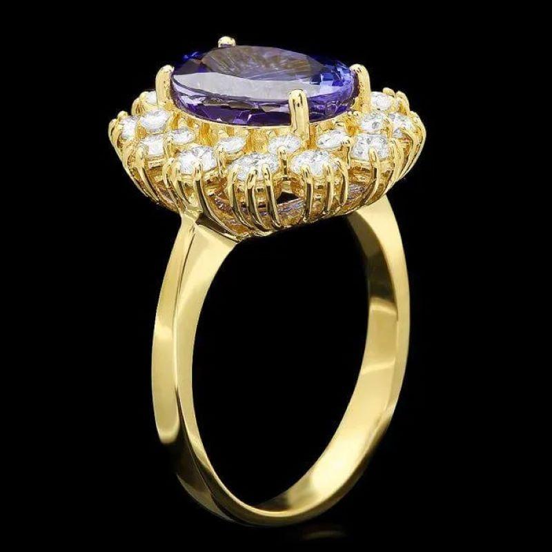 4.80 Carats Natural Tanzanite and Diamond 14K Solid Yellow Gold Ring

Total Natural Tanzanite Weight is: Approx. 3.60 Carats 

Tanzanite Measures: Approx. 11.00 x 9.00mm

Natural Round Diamonds Weight: Approx. 1.20 Carats (color G-H / Clarity