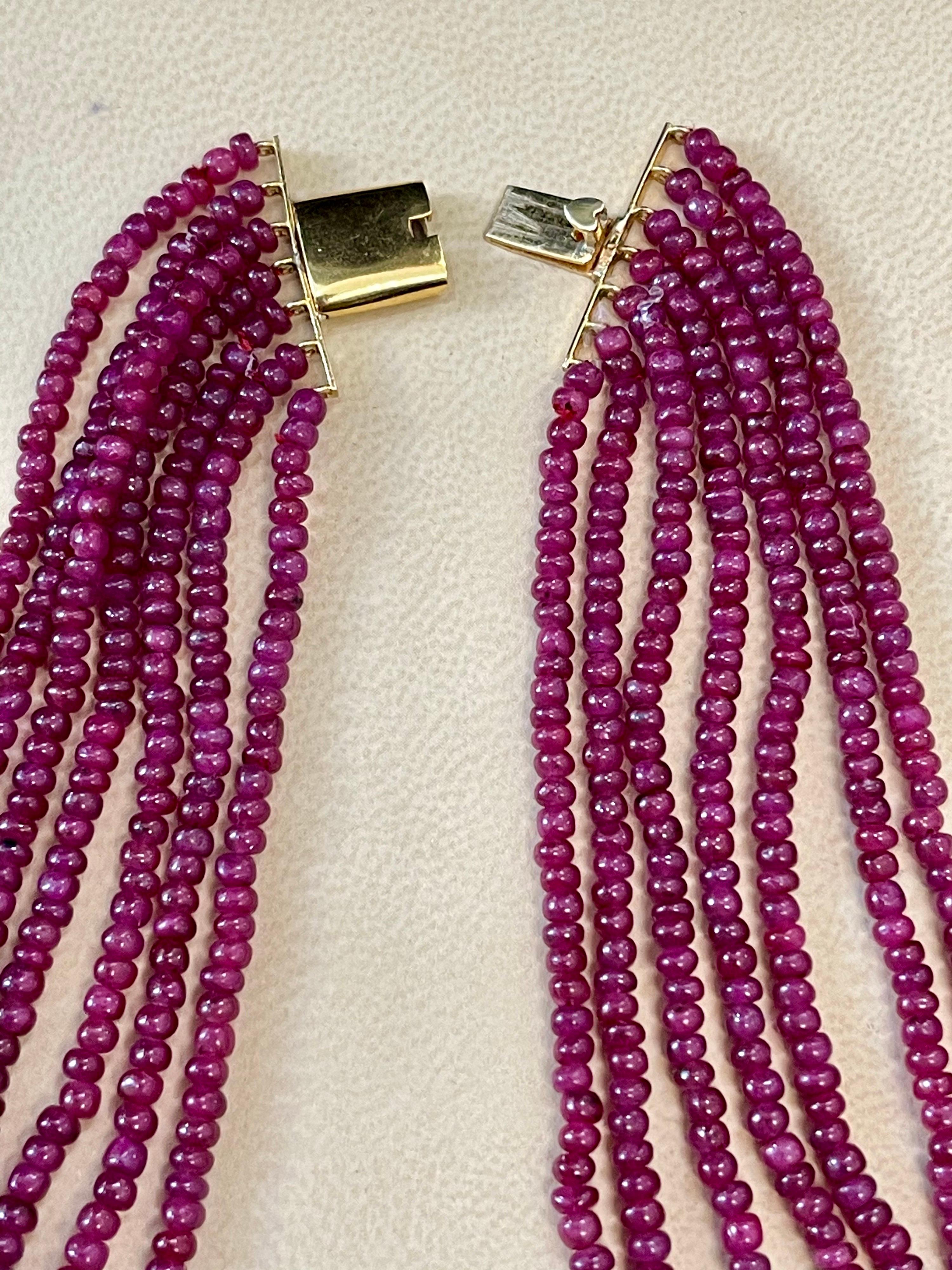 480 Ct 7 Layer Natural Smooth Ruby Bead Necklace 14k Gold Sapphire Diamond Clasp In Excellent Condition For Sale In New York, NY