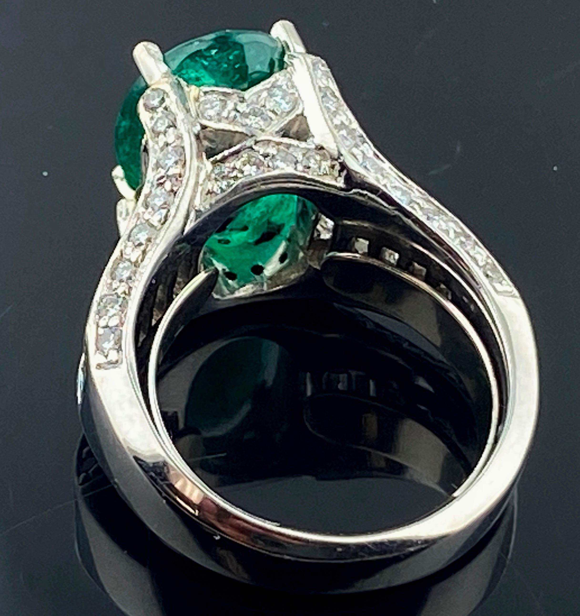 Emerald Cut 4.80 Carat Emerald and Diamond Ring in Platinum For Sale