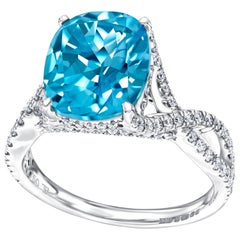 4.80 CT Oval Blue Topaz Engagement Ring 0.56 Carat Round Diamond in 18KT Gold