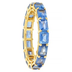 4.80 CTW Emerald Cut Sapphire 18 Karat Yellow Gold Eternity Band Ring