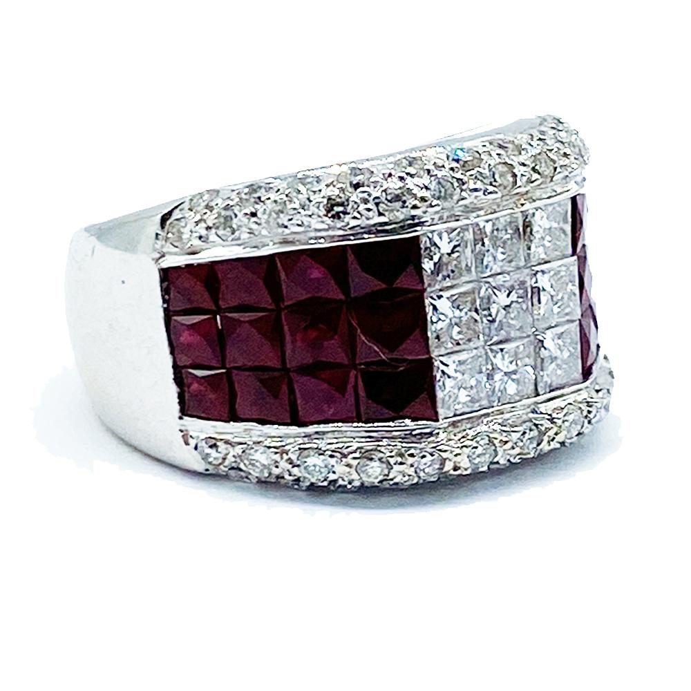 18 Karat white gold invisible diamond and ruby ring 16.50mm. 
Beautiful well made ring is a great attribute to your wardrobe!
Rich colored red rubies are a french-style cut where the faceting encompassing the table of the gemstone. 
The color is a