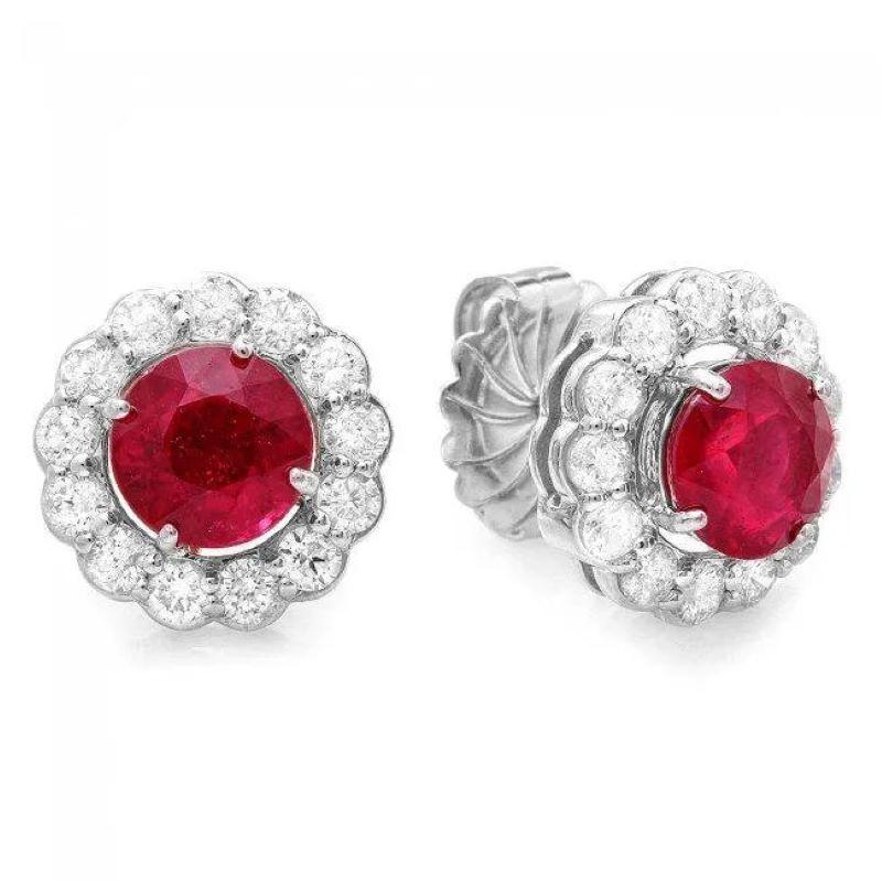 4.80ct Natural Red Ruby and Diamond 14K Solid White Gold Earrings

Total Natural Rubies Weight: Approx.  3.70 Carats

Natural Ruby Diameter: Approx. 7 mm

Ruby Treatment: Fracture Filling

Total Natural Round Cut Diamonds Weight: Approx.  1.10