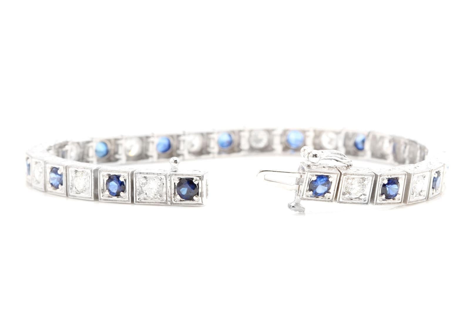 Very Impressive 4.80 Carats Natural Sapphire & Diamond 14K Solid White Gold Bracelet 

Suggested Replacement Value: $8,000.00

STAMPED: 14K

Total Natural Round Diamonds Weight: Approx. 2.30 Carats (color G-H / Clarity SI1-SI2)

Total Natural