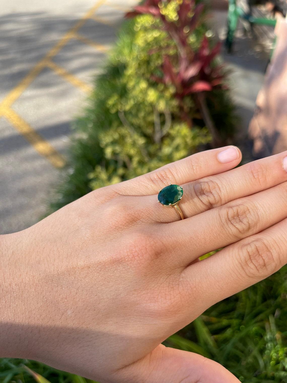 emerald gold engagement ring