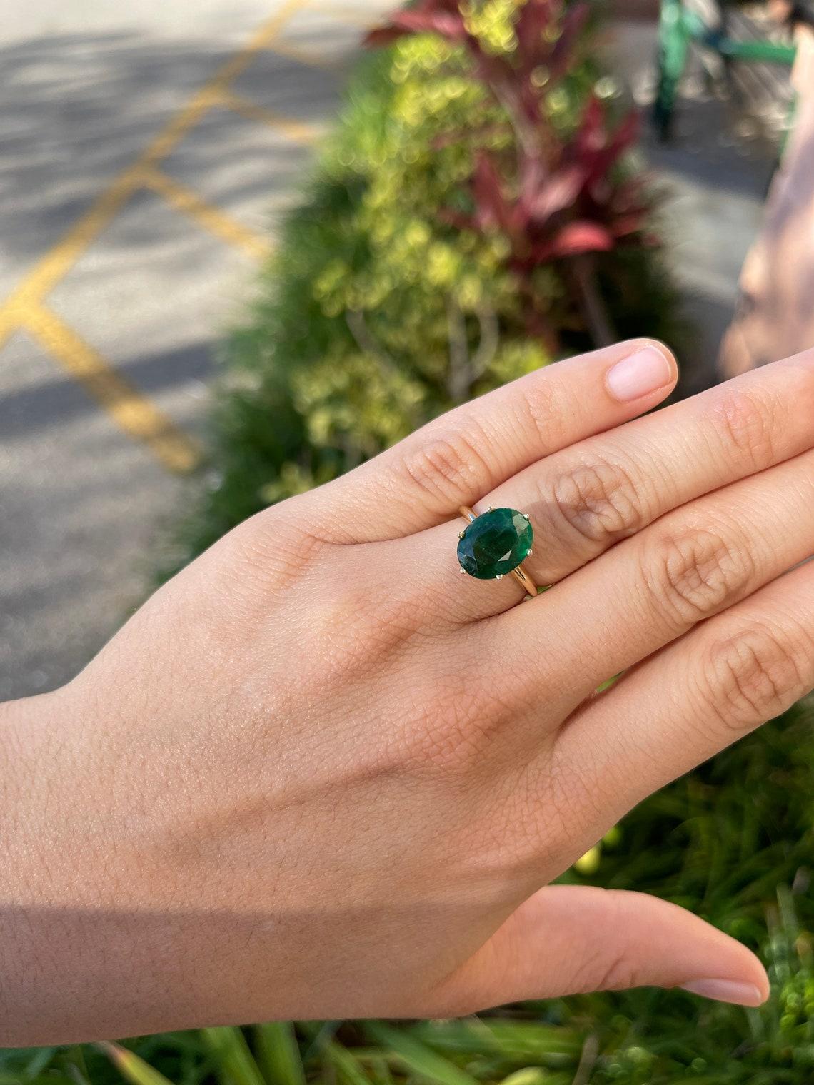 emerald solitaire ring