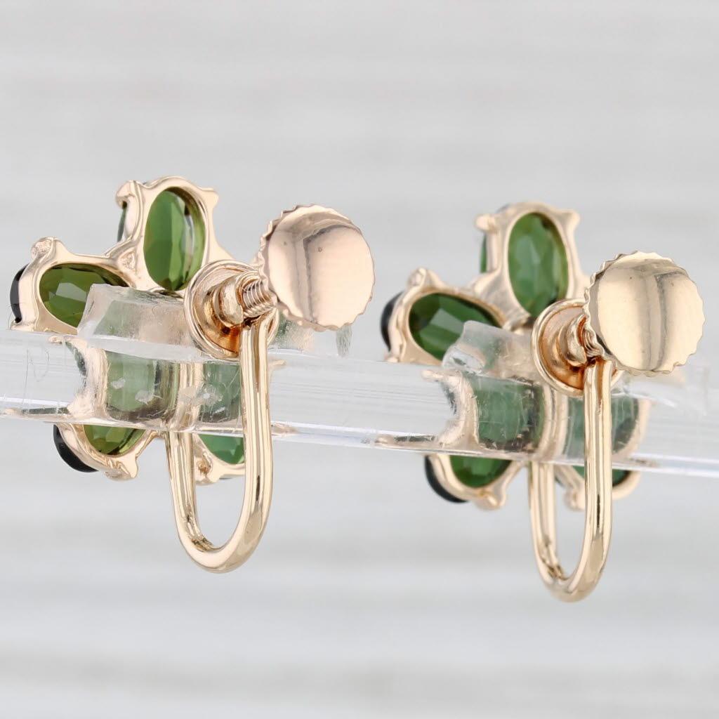 Gemstone Information:
- Natural Tourmalines -
Total Carats - 4.70ctw
Cut - Oval Brilliant
Color - Green

- Natural Diamonds -
Total Carats - 0.10ctw
Cut - Round Brilliant
Color - H - I
Clarity - SI1

Metal: 14k Yellow Gold
Weight: 4.9 Grams 
Stamps: