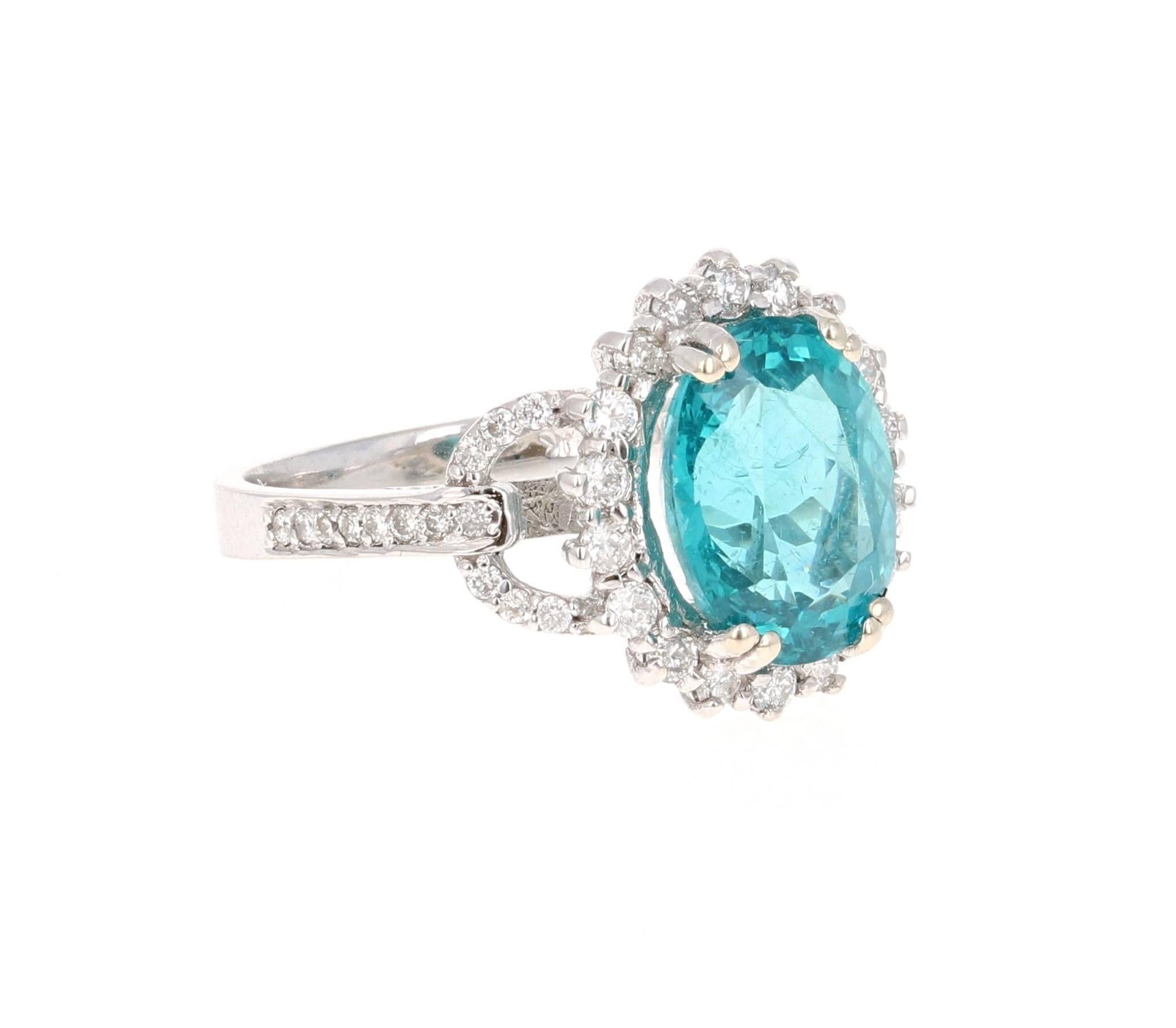 4.81 Carat Oval Cut Apatite Diamond White Gold Engagement Ring!

Gorgeous Apatite and Diamond Ring.  This ring has a 4.22 carat Oval-Cut Apatite in the center of the ring and is surrounded by 46 Round Cut Diamonds that weigh 0.59 carat.  The total