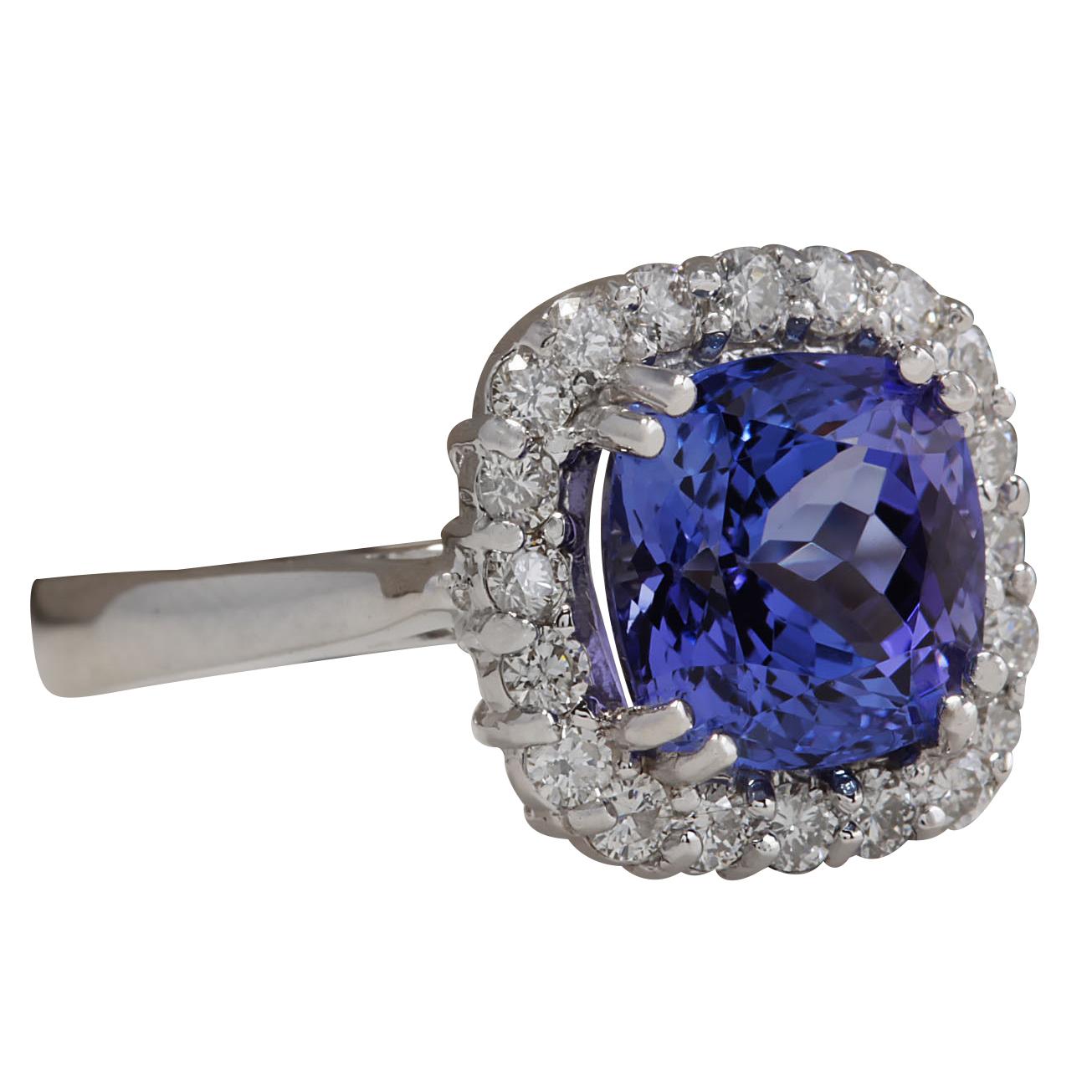 4.81 Carat Natural Tanzanite 14 Karat White Gold Diamond Ring
Stamped: 14K White Gold
Total Ring Weight: 5.2 Grams
Total Natural Tanzanite Weight is 4.11 Carat (Measures: 8.50x8.50 mm)
Color: Blue
Total Natural Diamond Weight is 0.70 Carat
Color: