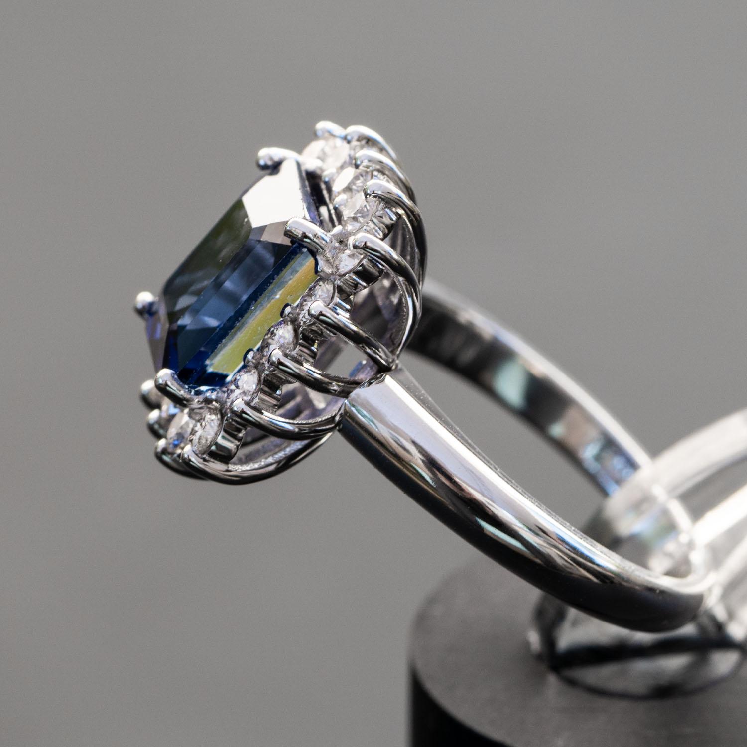 Emerald Cut 4.81 carat sapphire 0.70 carat natural diamonds statement ring For Sale