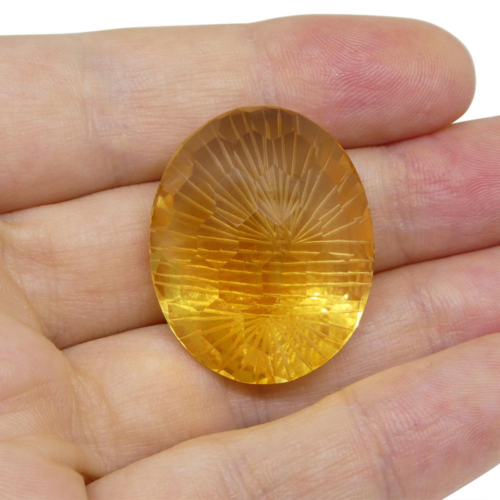 Description:

Gem Type: Citrine
Number of Stones: 1
Weight: 48.23 cts
Measurements: 28.79 x 23.36 x 14.13 mm
Shape: Oval
Cutting Style Crown: Honeycomb
Cutting Style Pavilion: Brilliant Cut
Transparency: Transparent
Clarity: Very Very Slightly