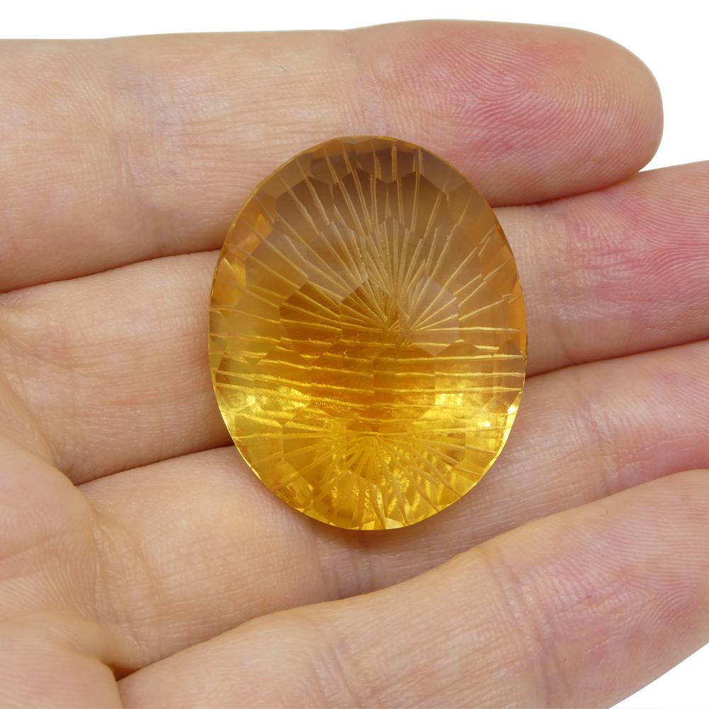 Women's or Men's 48.23ct Oval Yellow Honeycomb Starburst Citrine from Brazil For Sale