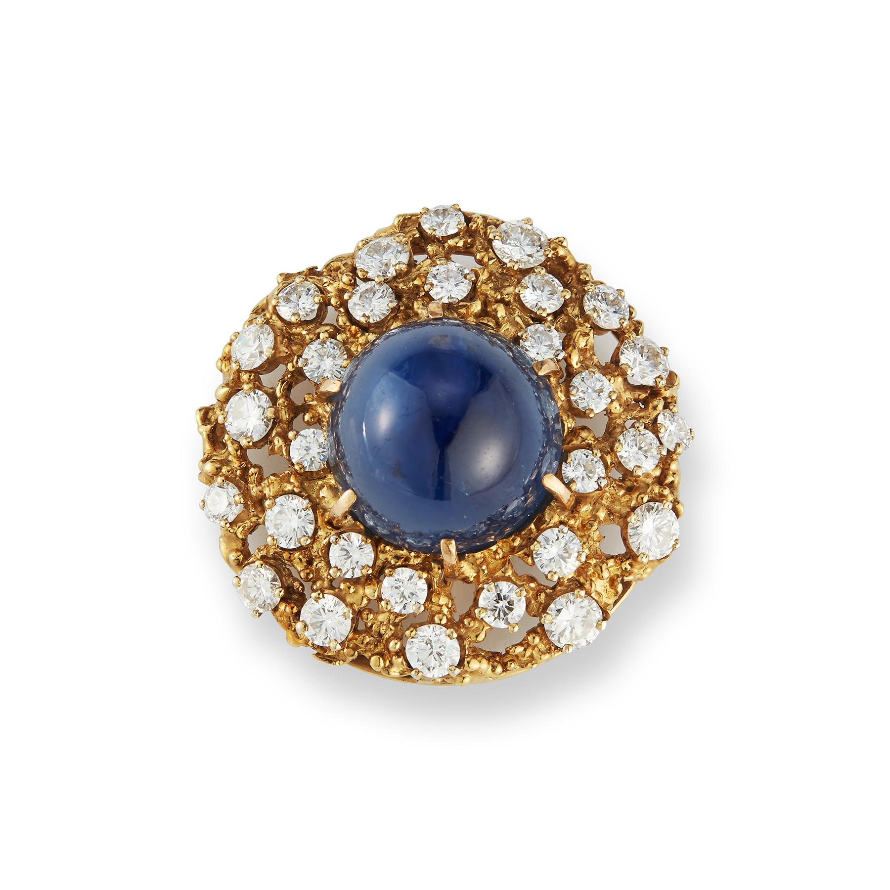 48.24 Certified Natural Sapphire Brooch by Ruser

1 cabochon sapphire weighing 48.24 carats certified as natural by AGL laboratories and of Ceylown origin, surrounded by  29 round cut diamonds set in Platinum & 18K gold 

Measurements: 1.5
