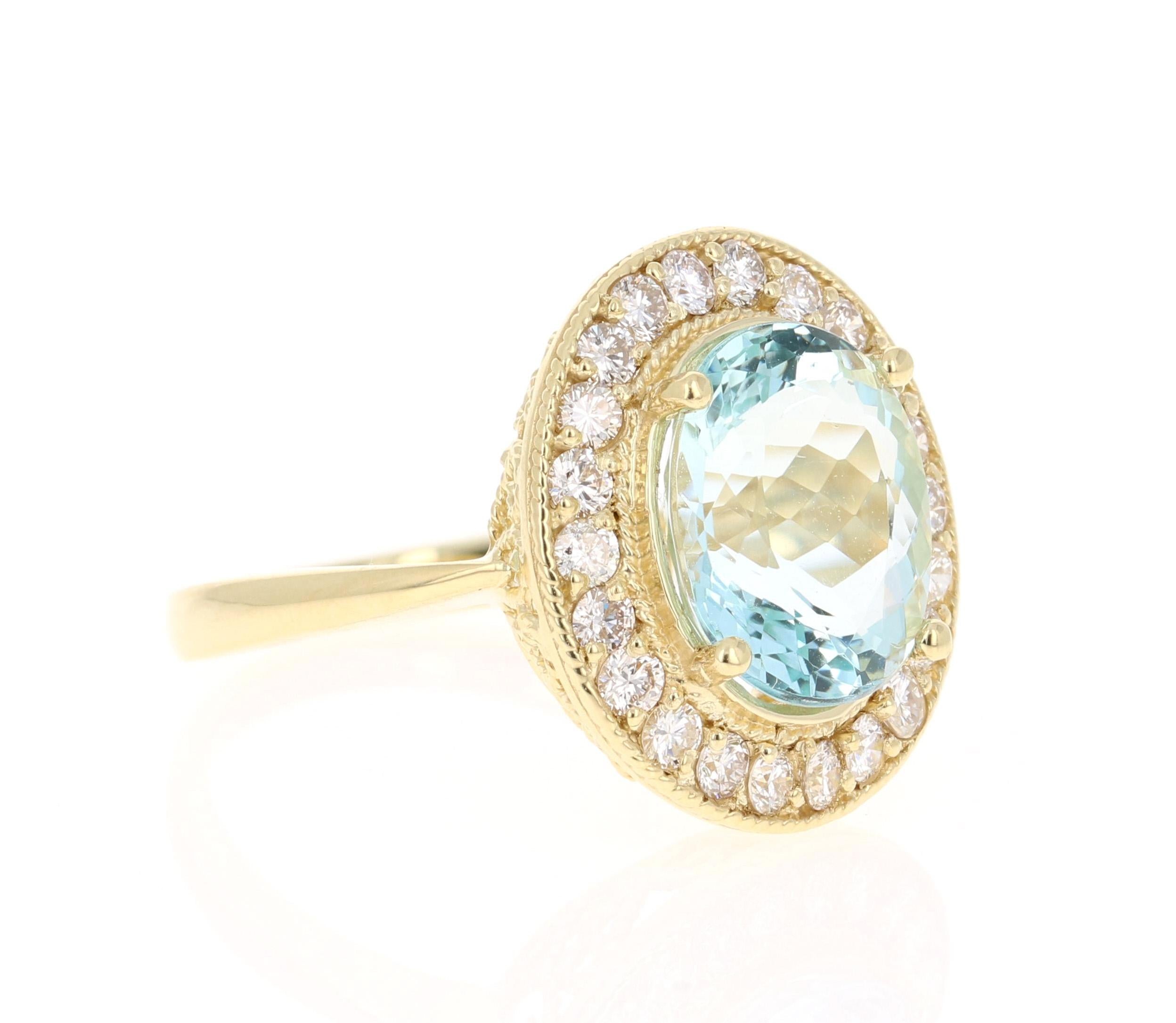 Stunning Victorian-Inspired Beauty! 
This ring has a beautiful 4.07 Carat Oval Cut Aquamarine and is surrounded by 22 Round Cut Diamonds that weigh 0.77 carat (Clarity: VS, Color: H). The total carat weight of this ring is 4.84 Carats. 

The Oval