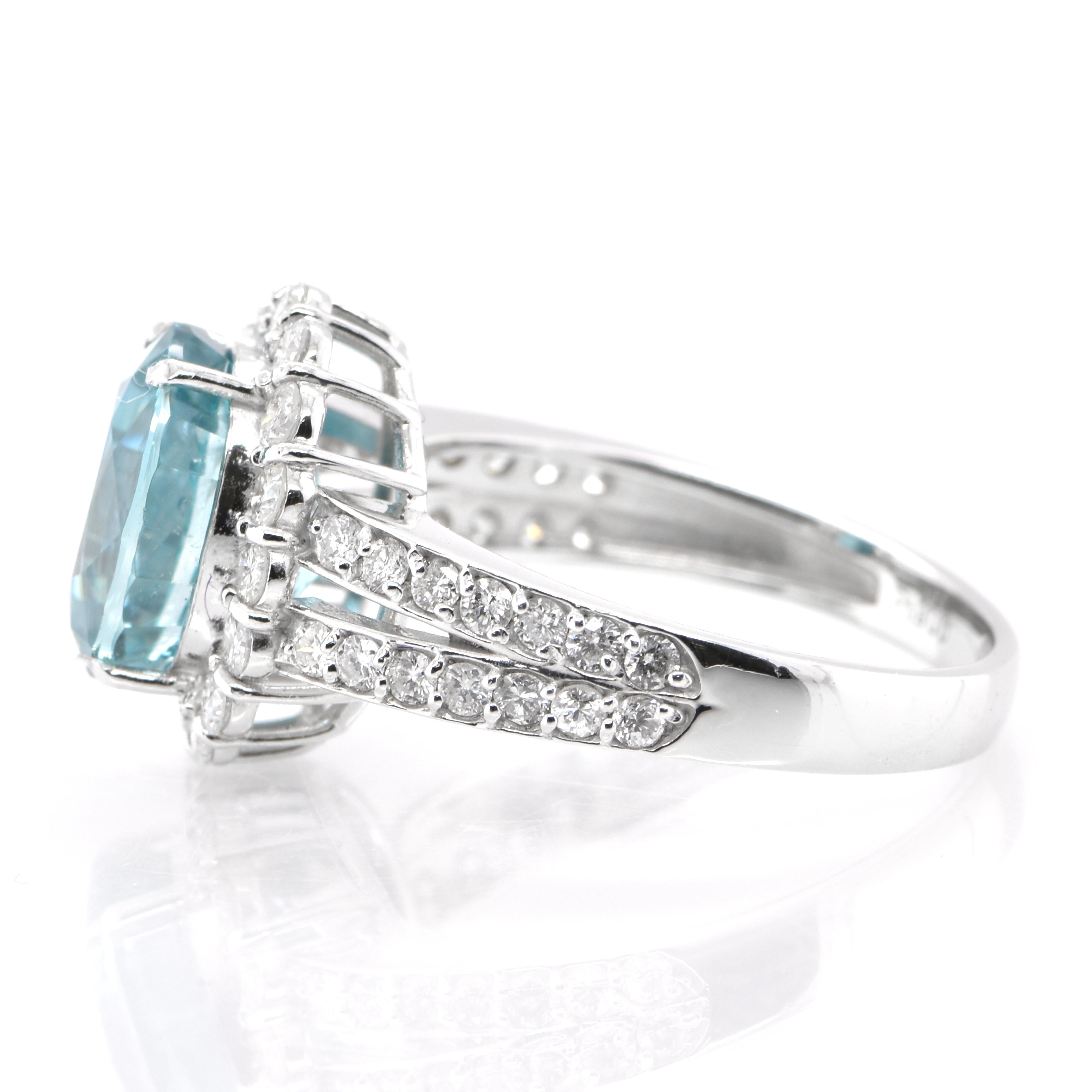 Oval Cut 4.84 Carat Natural Blue Zircon and Diamond Ring Set in Platinum