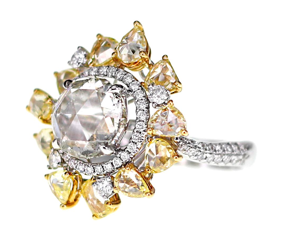 2.58 carat White Old European Cut diamond is set along with 2.26 carat of fancy color rose cut diamond. The ring is made in 18 K gold and is hand made in Hong Kong.
Ring Size: US 5.75