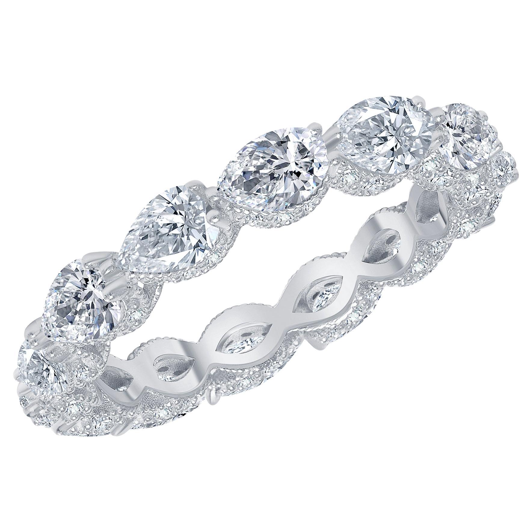 For Sale:  4.84 Ct. Tw. Pear Shape Diamond Eternity Ring with Side Round Diamonds