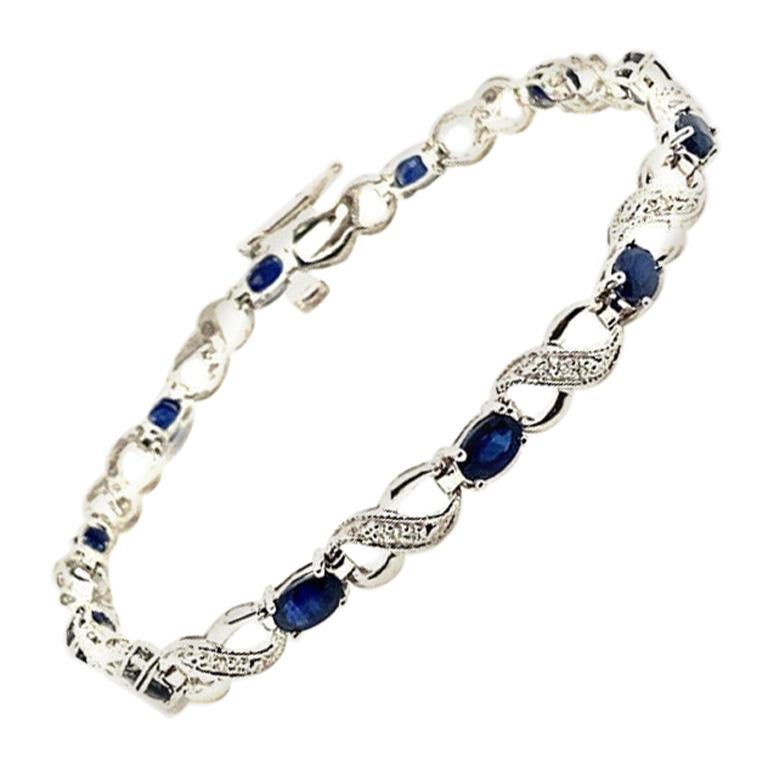 4.85 Carat Diamond and Sapphire Bracelet G SI 14 Karat White Gold For Sale