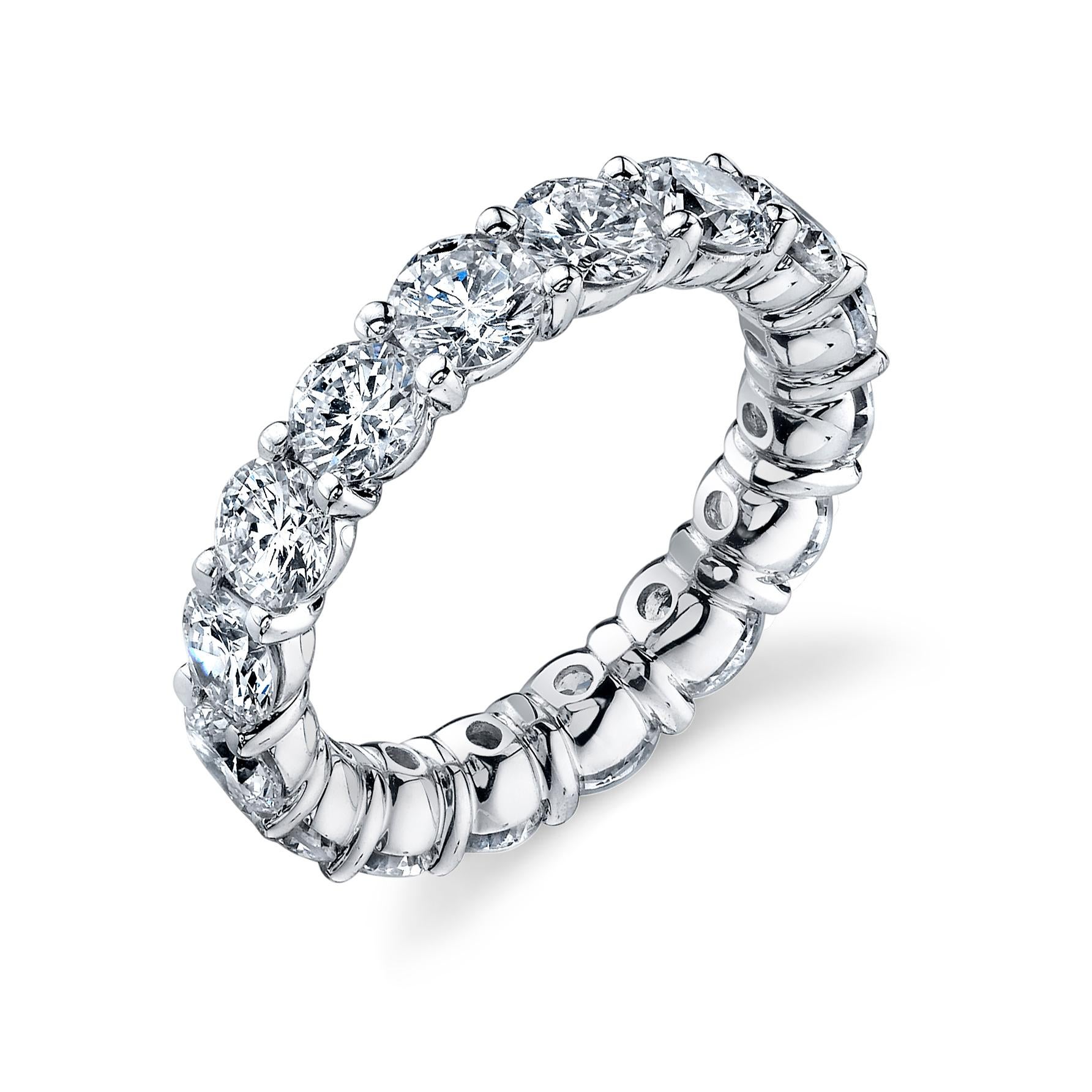 This beautiful Diamond Eternity Band is crafted from platinum and features 4.85 carats of high-grade G/H SI Round Brilliant Cut diamonds. This stunning piece is highlighted by 16 round cut stones, and is sized at 6. Showcase your eternal love with