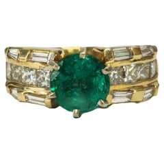 Ring aus 14 Karat Gelbgold mit 4,85 Karat Smaragd und Diamant