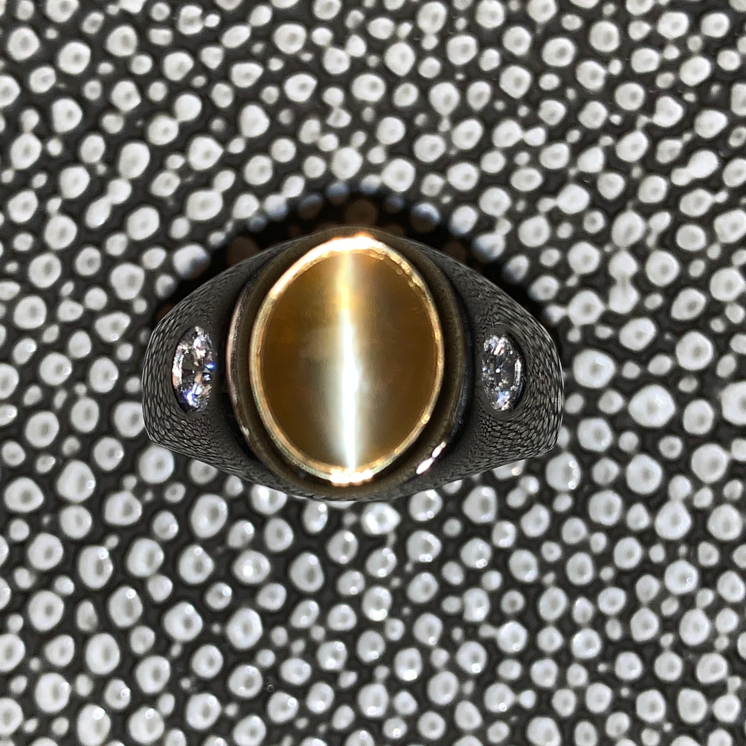 4.85+ Carat Honey Cats Eye, set in platinum. 2 Side Round Diamonds weighing a total of 0.34 Carats with G-H Color, VS - SI Clarity.

1. Carat Weight: 4.85 + Cats Eye

2. Color: Milk & Honey ( Eye is Milky and rest is Honey Color)

3. Tone:  Medium -