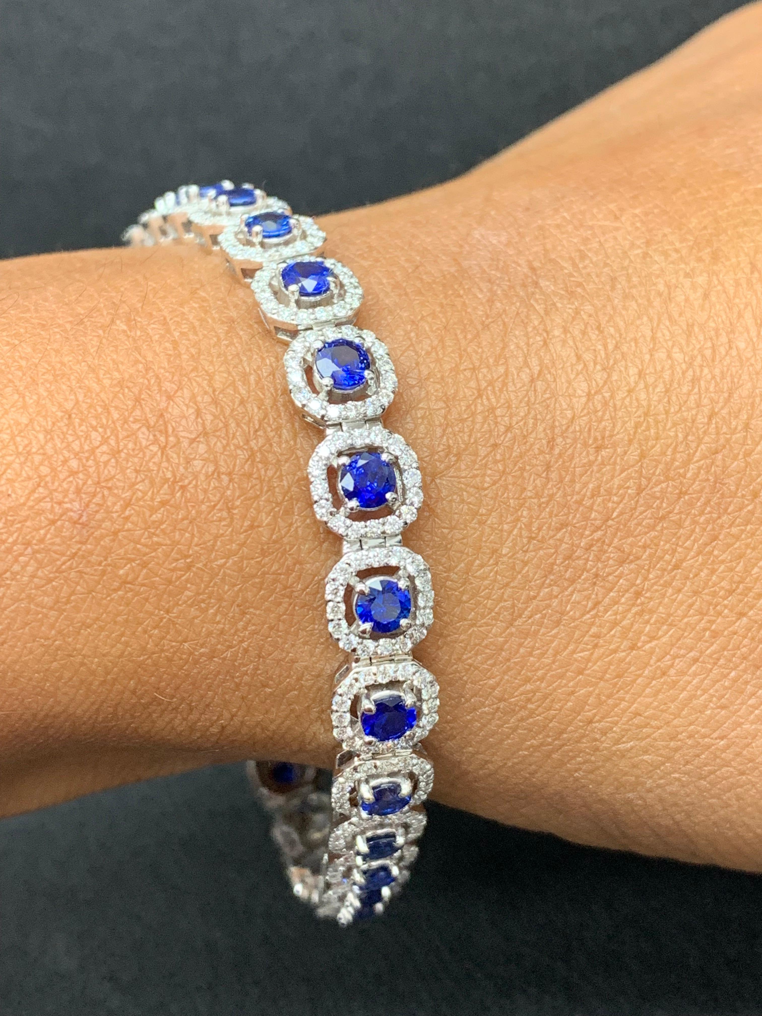 Contemporary 4.85 Carat Round BlueSapphire and Diamond Halo Tennis Bracelet in 14k White Gold For Sale