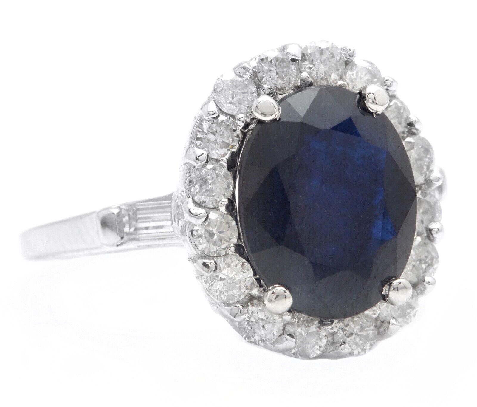 4.85 Carats Exquisite Natural Blue Sapphire and Diamond 14K Solid White Gold Ring

Suggested Replacement Value $6,000.00

Total Blue Sapphire Weight is: Approx. 4.00 Carats (Diffused)

Sapphire Measures: Approx. 10.80 x 8.80mm

Natural Round &