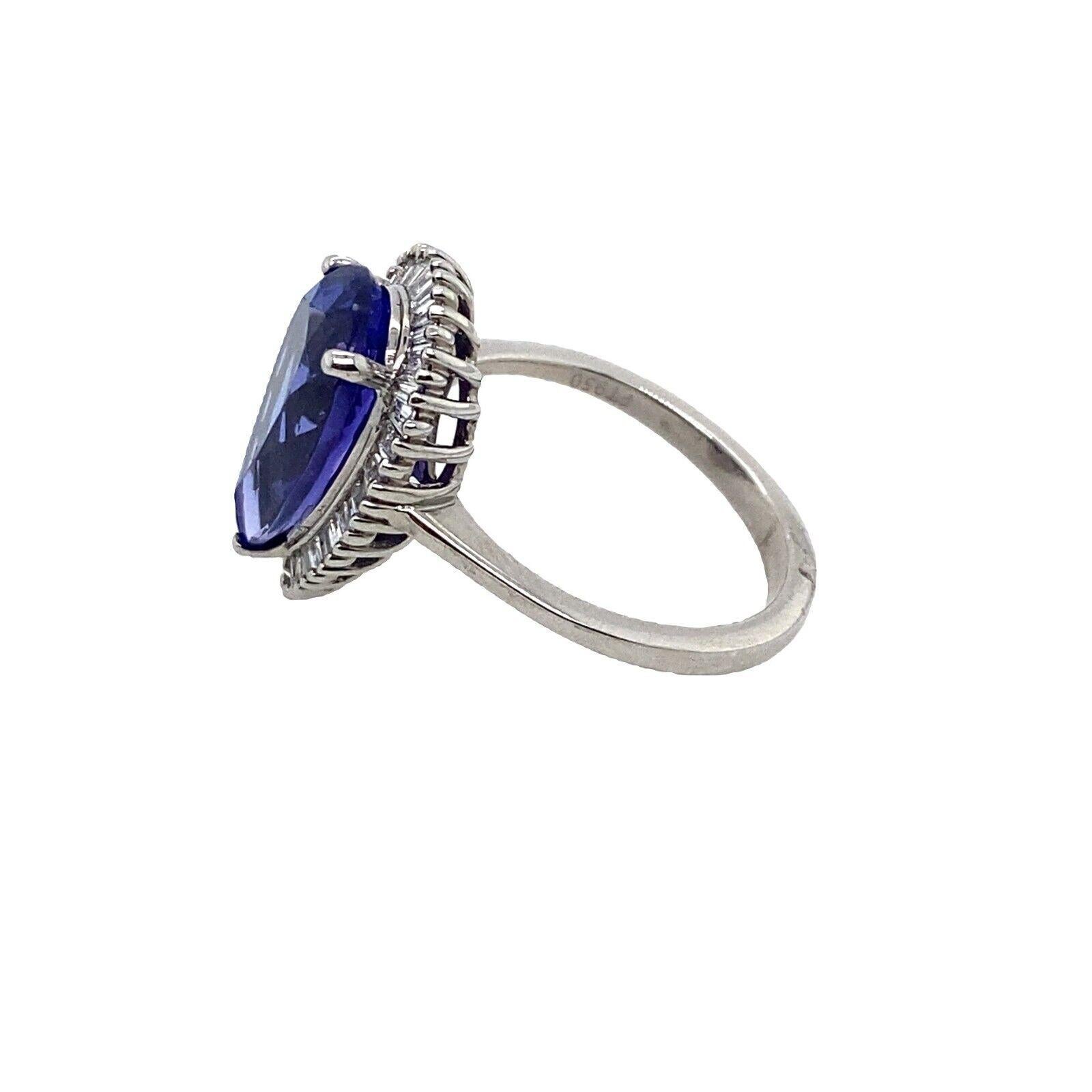 4.85ct Pear Shape Natural Tanzanite Surrounded by 0.42ct of Diamonds Ring In Excellent Condition For Sale In London, GB