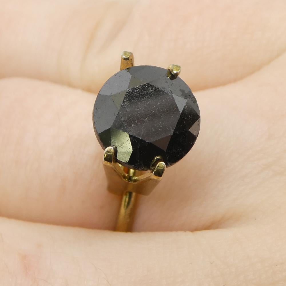 Description:

Gem Type: Diamond 
Number of Stones: 1
Weight: 4.85 cts
Measurements: 10.10 x 10.10 x 7.17 mm
Shape: Round
Cutting Style Crown: Brilliant Cut
Cutting Style Pavilion: Brilliant Cut 
Transparency: Opaque
Clarity: N/A
Colour: Black
Hue: