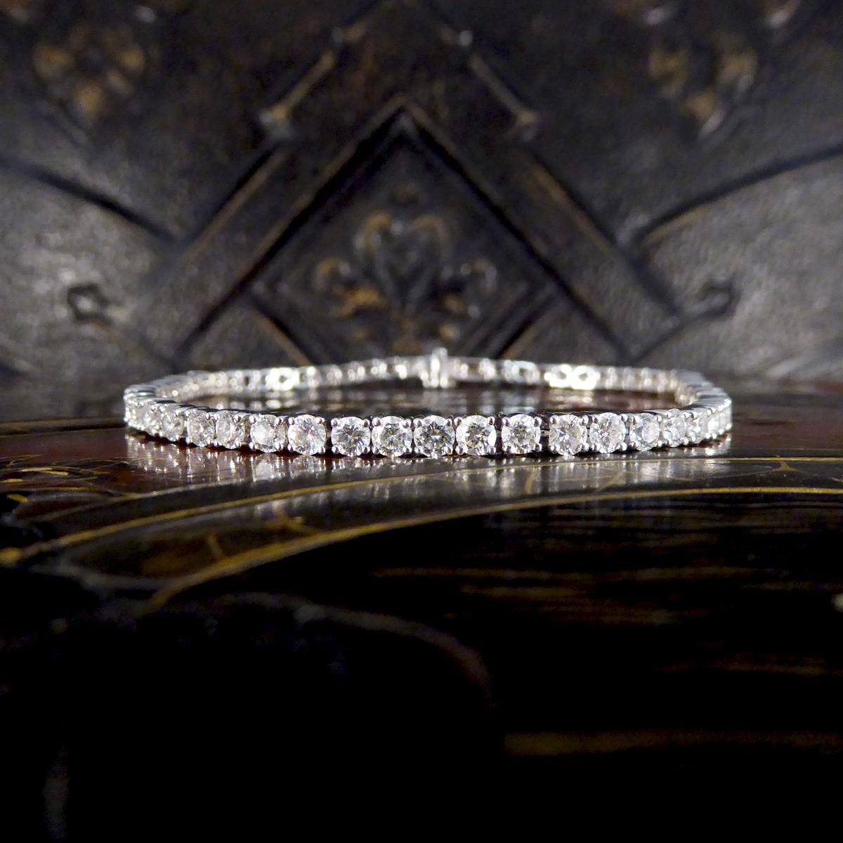 Modern 4.85ct Round Brilliant Cut Diamond Tennis Bracelet Set in 18ct White Gold