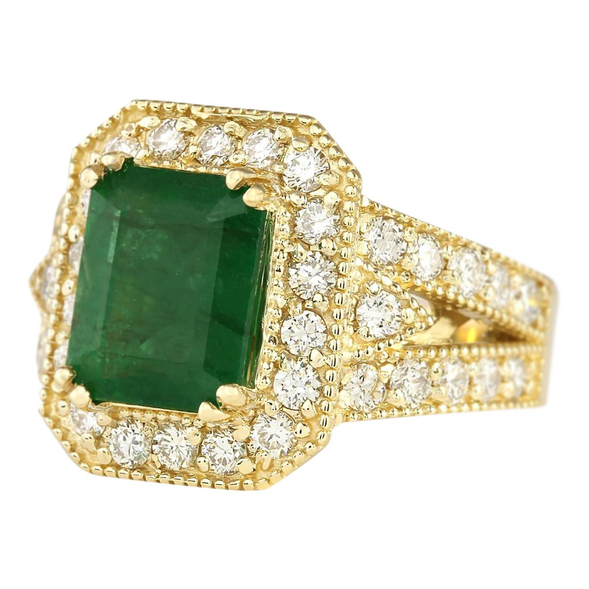 Stamped: 14K Yellow Gold
Total Ring Weight: 9.8 Grams
Emerald Weight is 3.58 Carat (Measures: 10.00x8.00 mm)
Total Natural Diamond Weight is 1.28 Carat
Color: F-G, Clarity: VS2-SI1
Face Measures: 15.80x13.25 mm
Sku: [703918W]