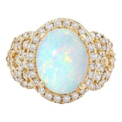 Natürlicher Opal-Diamantring aus 14 Karat Gelbgold 