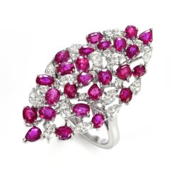 4.86 Carats of Natural Rubies and Diamonds Cluster Ring Made in 18K White Gold