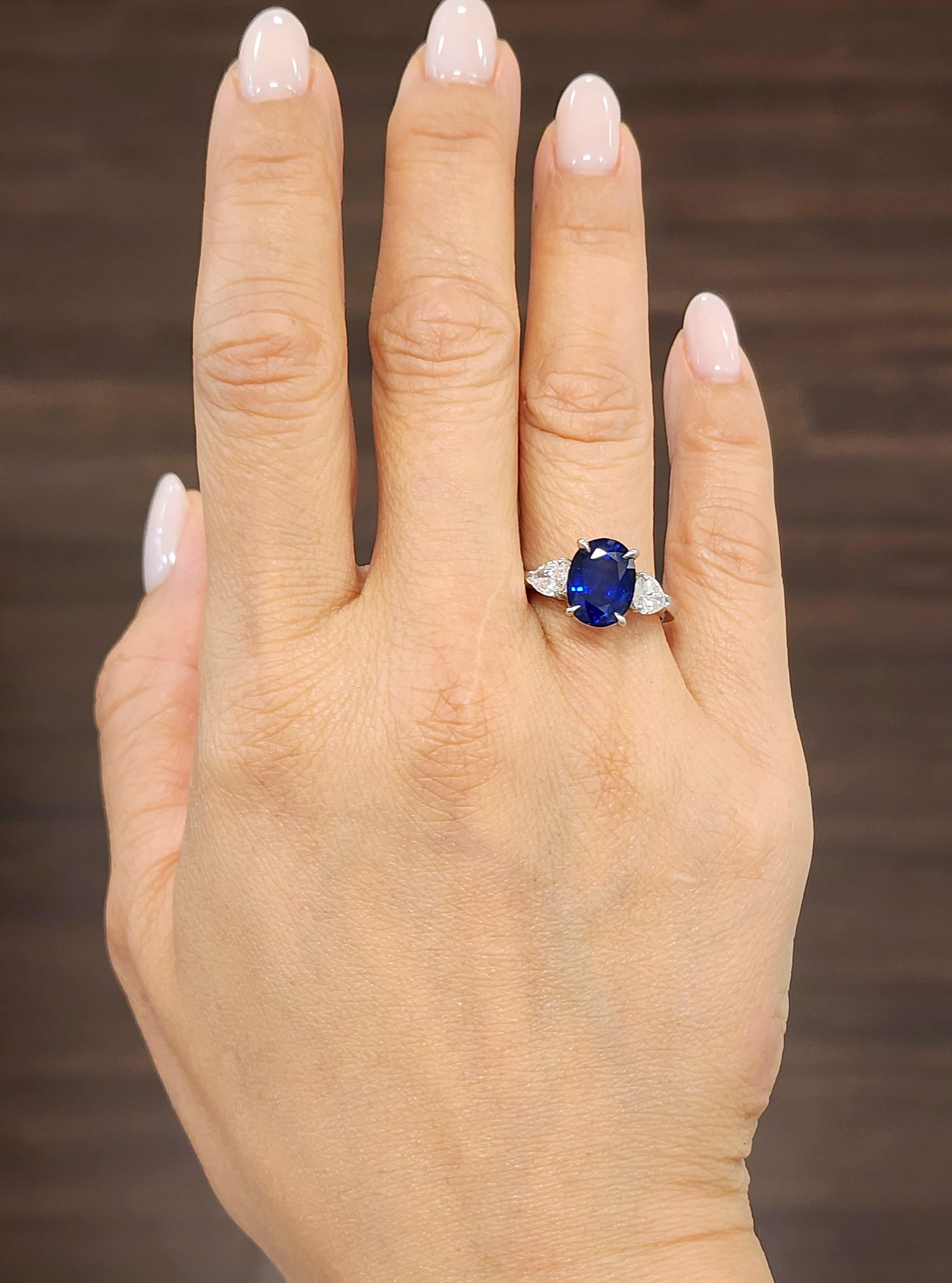  Introducing the stunning 4.86 natural sapphire and diamond ring, a true masterpiece of design and craftsmanship. This ring boasts a magnificent oval-shaped sapphire at the center, which has been certified by GIA for its authenticity and quality.