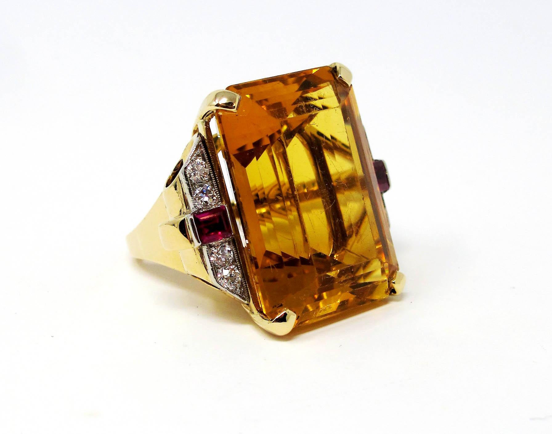 Let your fingers play dress-up with this sensational, oversized cocktail ring. Featuring an eye-catching emerald cut citrine stone, as well as shimmering diamond and ruby accents, this stunner of a ring makes a bold statement with both its