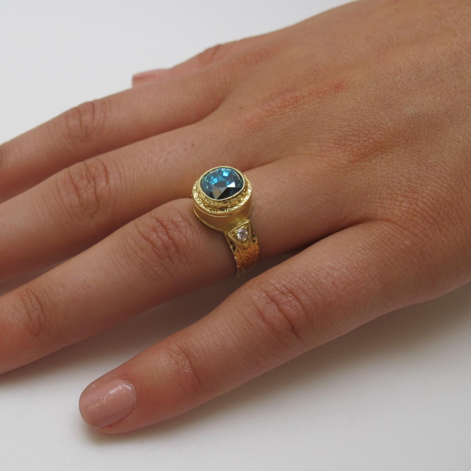 Artisan 4.87 Carat Blue Zircon with 0.11 Carat Diamonds 18 Karat Yellow Gold Ring