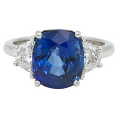 4.87 Carat Natural Blue Cushion Cut Sapphire & Half Moon Shaped Diamond Ring