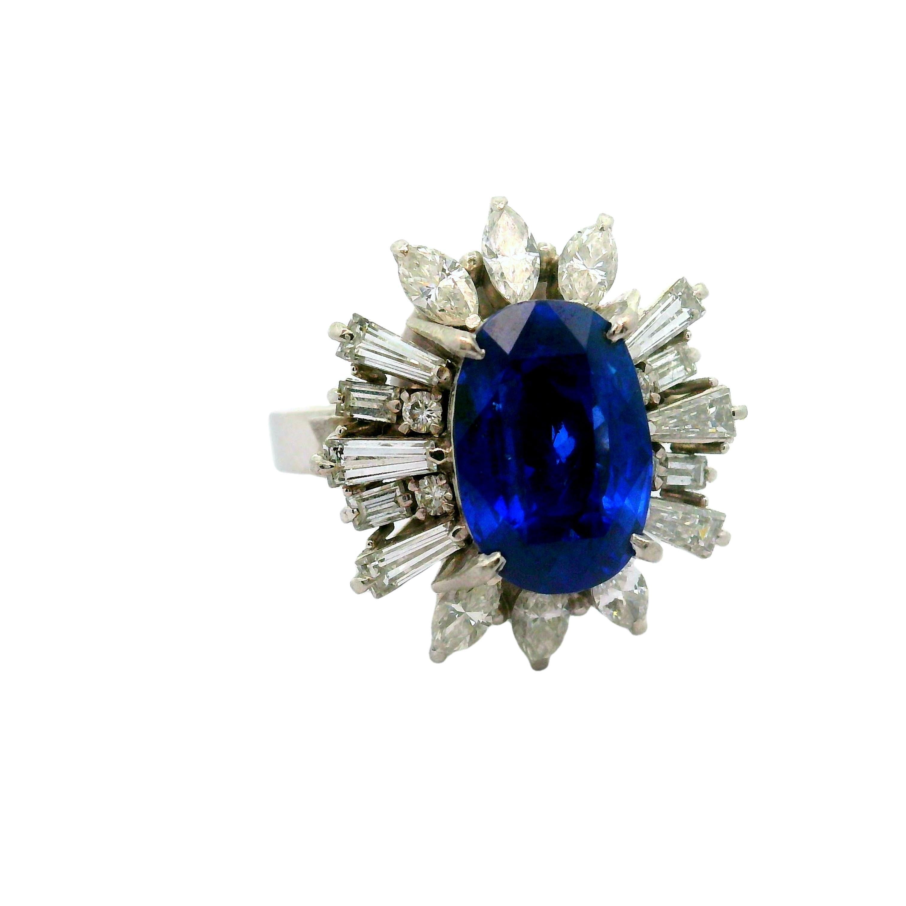 A striking piece of contemporary jewelry. This fashion ring showcases a captivating 4.87-carat oval sapphire, radiating a deep and luscious blue color. Additionally, it is certified by the GIA as natural with no treatment of any kind. Surrounding