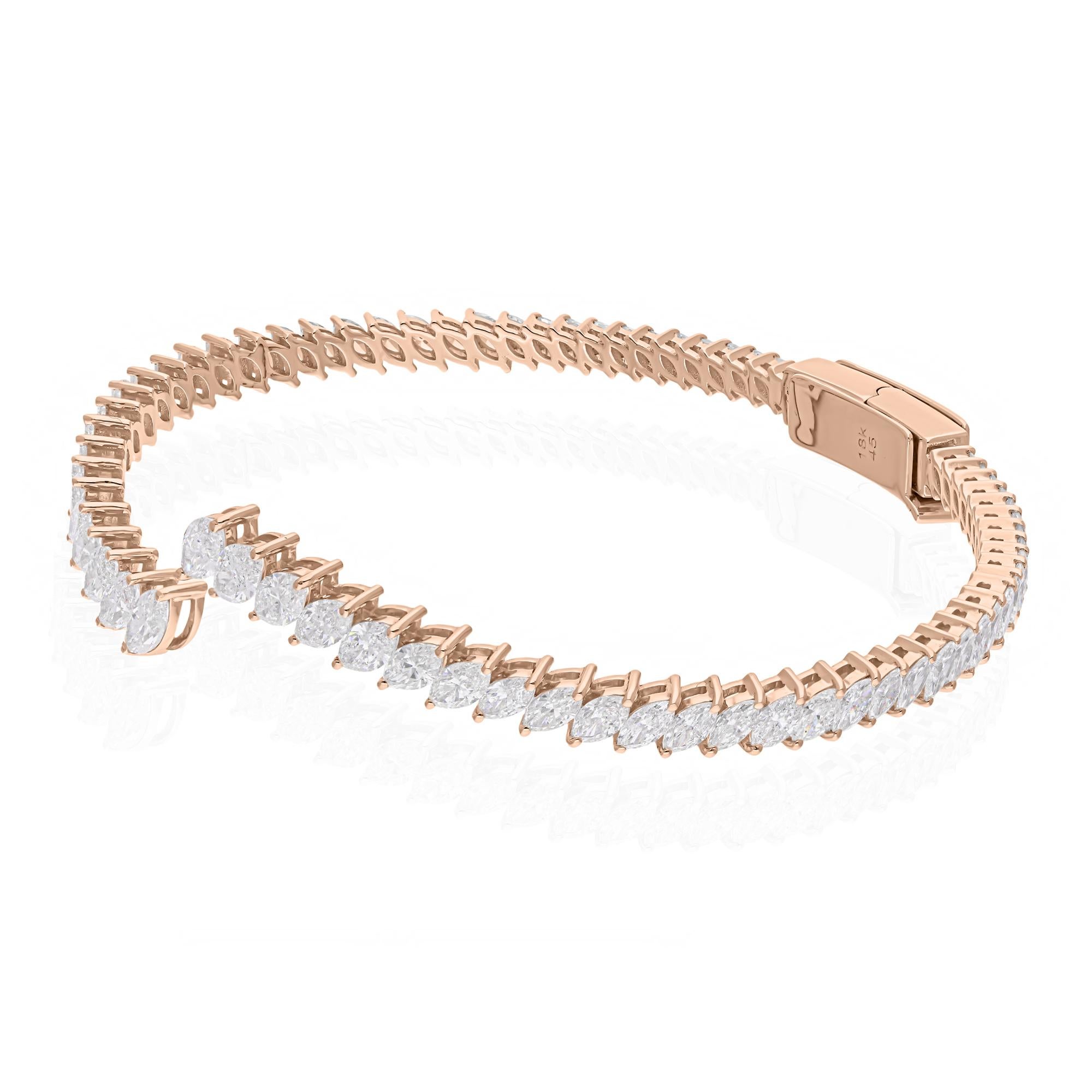 Add a touch of elegance to your collection with this exquisite 4.87 carat marquise diamond cuff bangle bracelet. Expertly crafted in 18 karat rose gold, this bracelet showcases the perfect blend of modern design and timeless luxury. The marquise