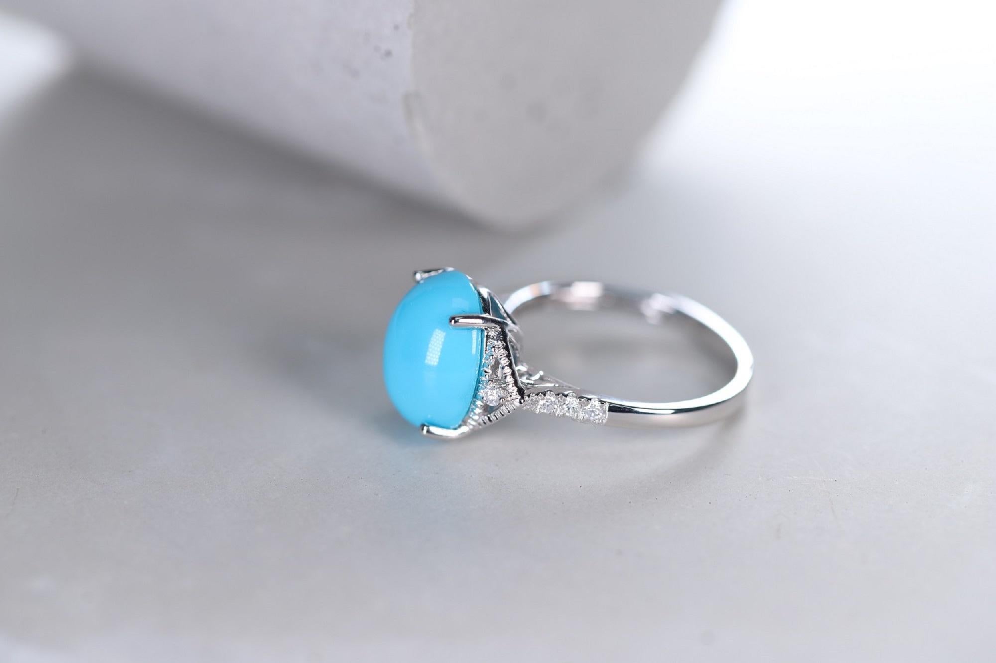Oval Cut 4.87 Carat Turquoise and 0.14 Carat Diamond 14 Karat White Gold Cocktail Ring For Sale