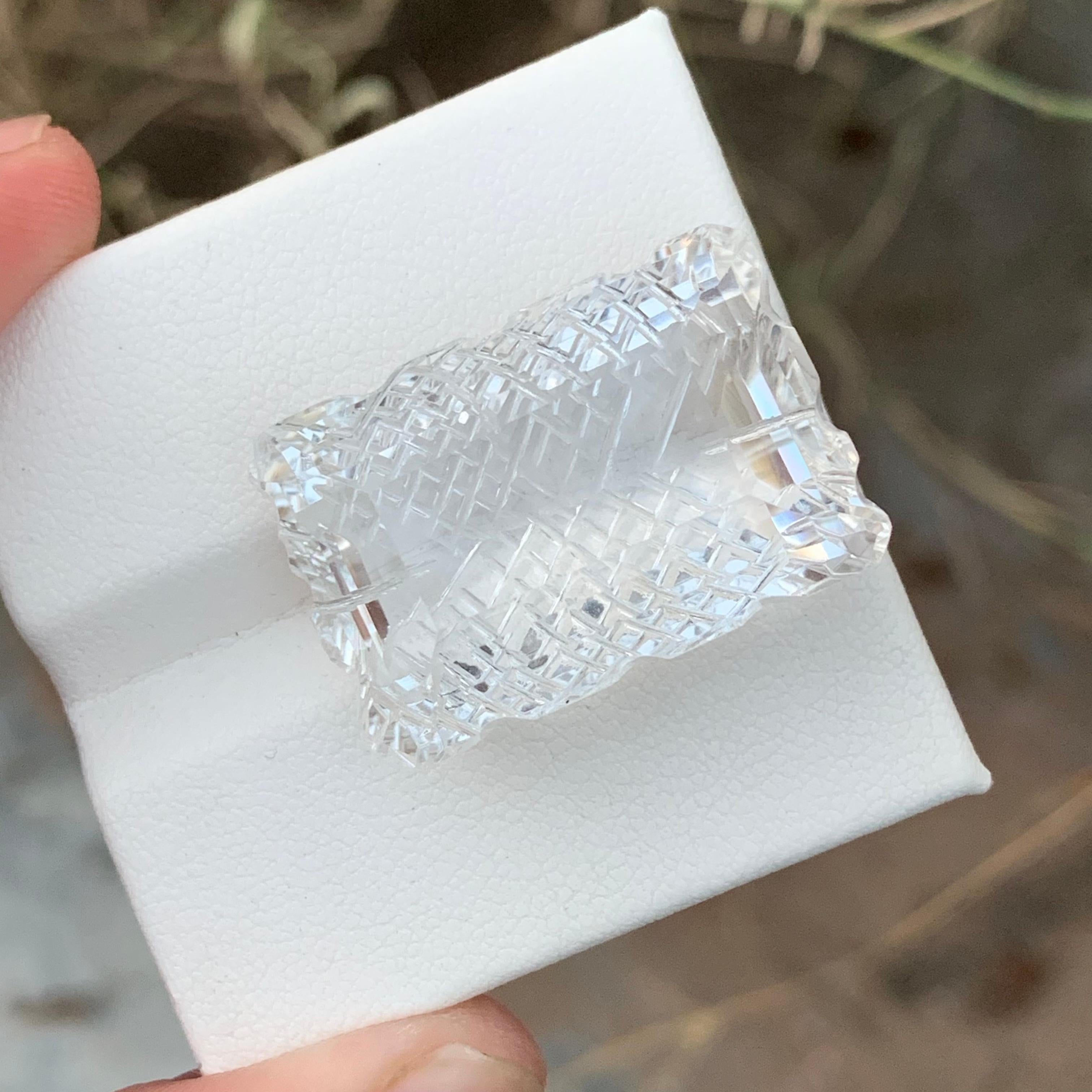 Clear Crystal Quartz 
Weight: 48.70 Carats 
Dimension: 26x17.9x13 Mm
Origin: Balochistan Pakistan 
Color: Colorless 
Shape: Carving / Emerald 
Treatment: None
Certificate: On Customer Demand 
.
Clear crystal quartz, also known as rock crystal, is a