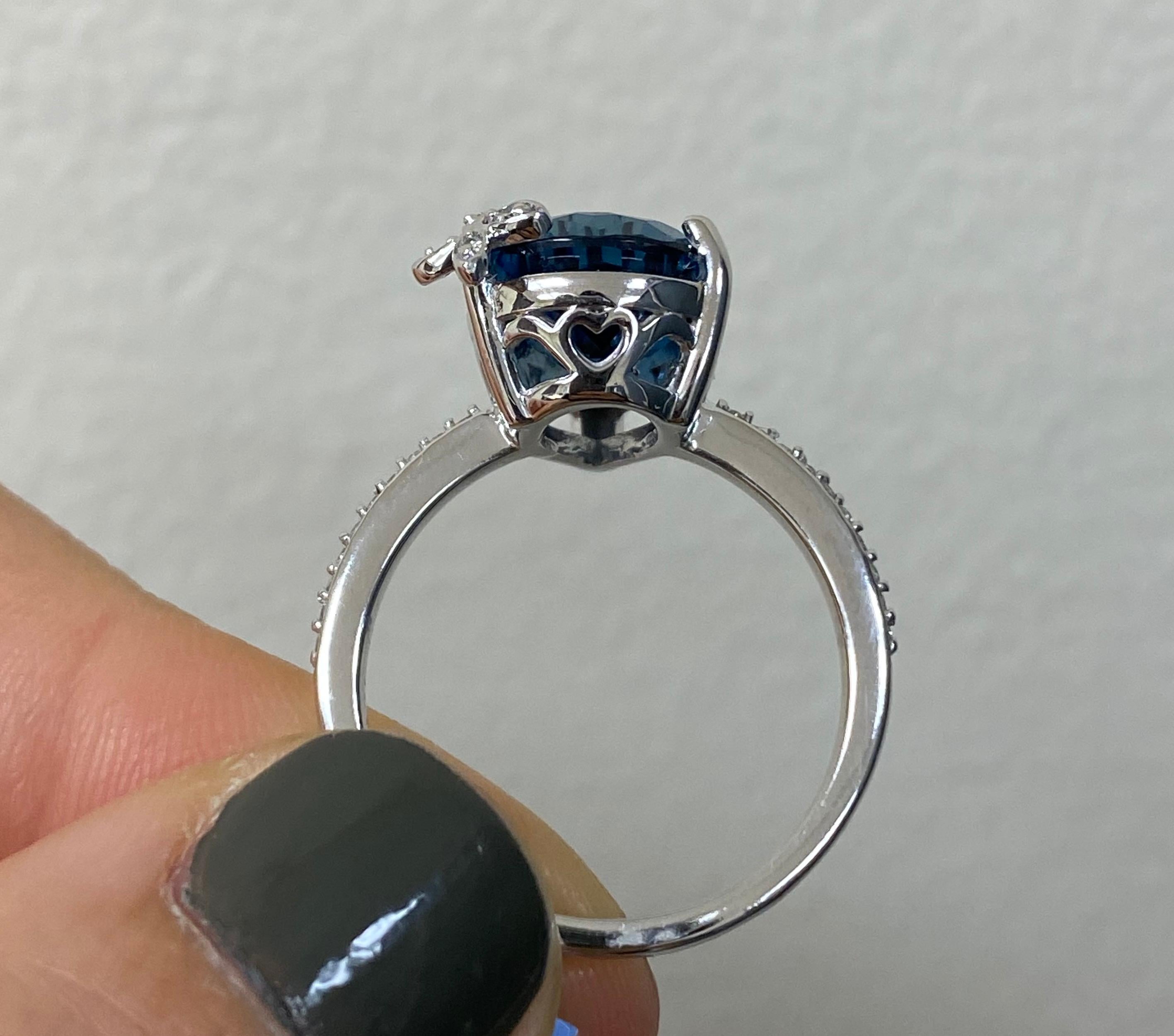 Contemporary 4.88 Carat Blue Topaz and Diamond Butterfly Ring