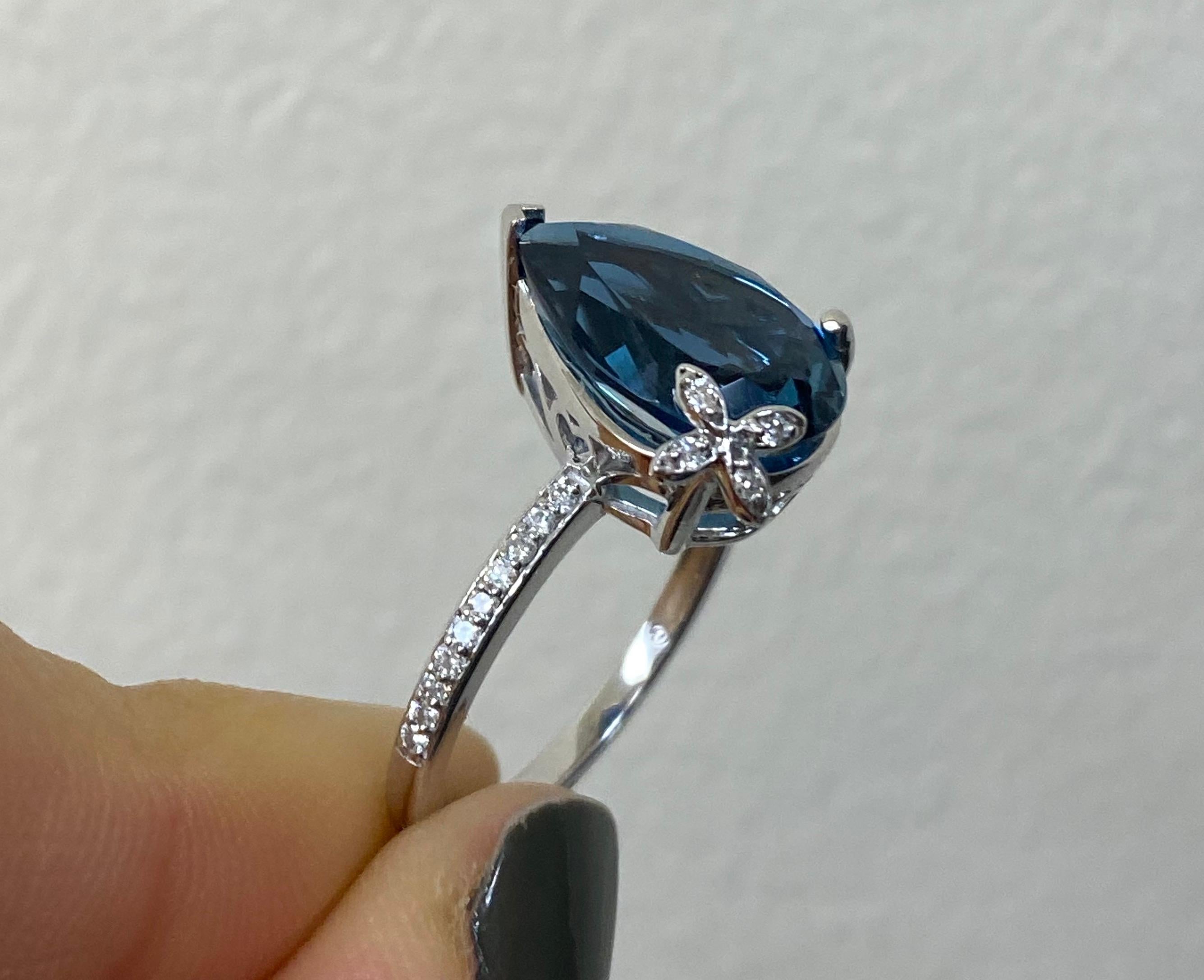 Pear Cut 4.88 Carat Blue Topaz and Diamond Butterfly Ring