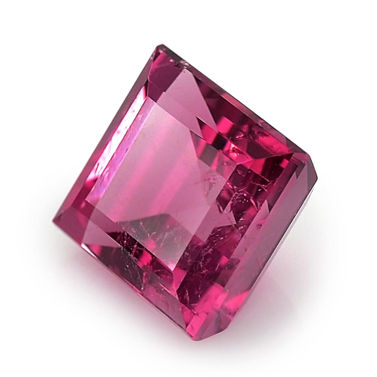 Identification: Natural Rubellite 4.88 carats 

Carat: 4.88 carats
Shape: Rectangle 
Measurements: 9.9 x 8.7 x 6.1 mm
Cut: Brilliant/Step
Color: Pink
Clarity: very eye clean

Introducing a magnificent natural Rubellite gemstone with a substantial